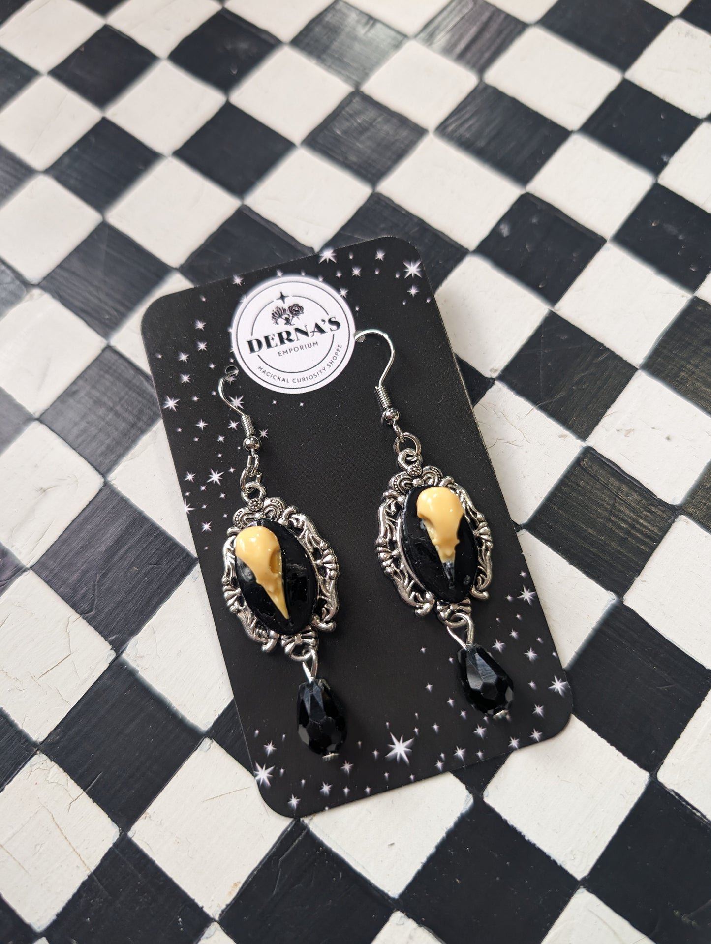 Faux Crow Skull Earrings in Frame