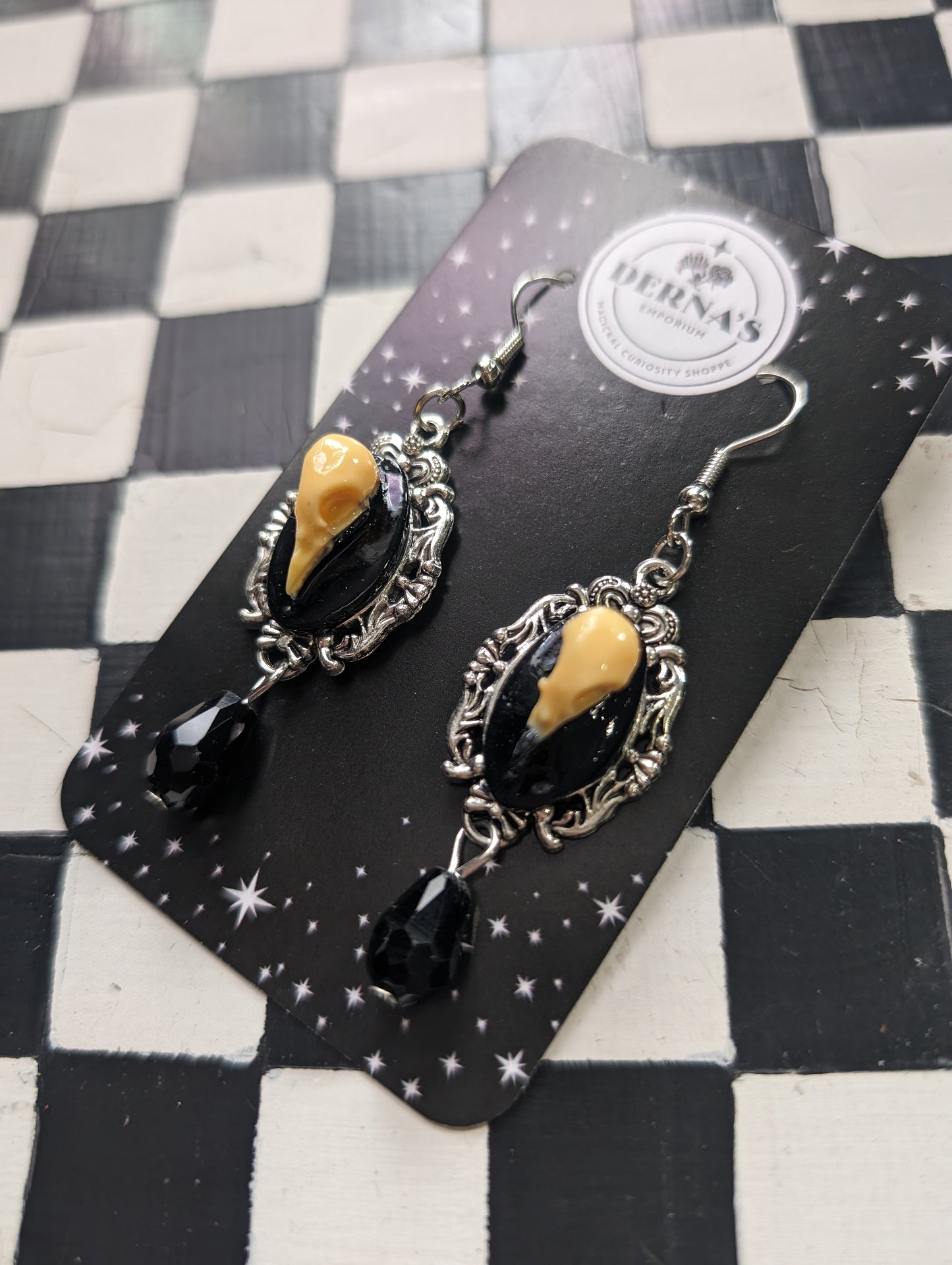 Faux Crow Skull Earrings in Frame